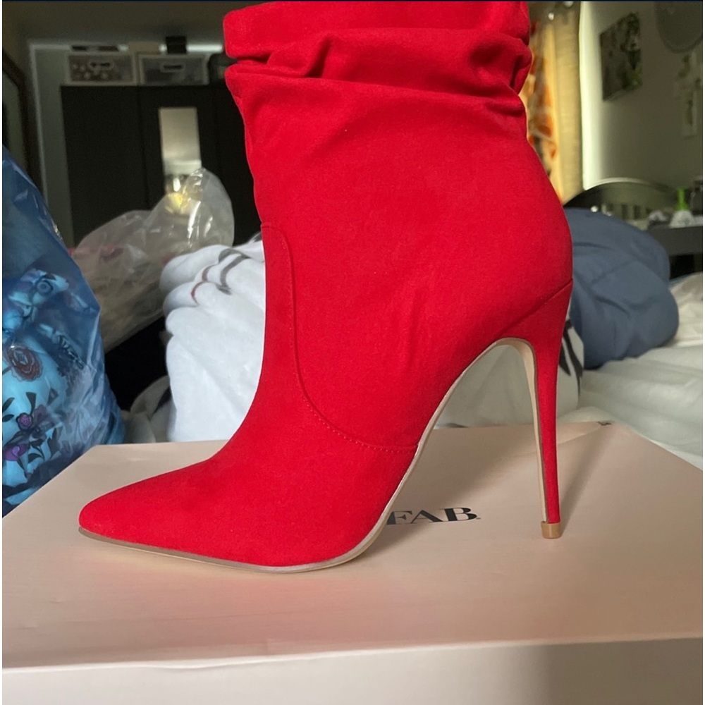 Red stiletto booties